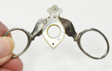 Vintage Metal & Mother of Pearl Cigar Cutter Compliments of Wolf Sayer & Heller
