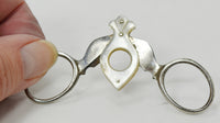 Vintage Metal & Mother of Pearl Cigar Cutter Compliments of Wolf Sayer & Heller