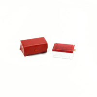 A view of the red case and the portable Daintee Shave.