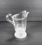 Another side view of the antique glass creamer produced by Gillinder and Sons.