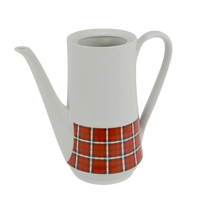 Shown is a c. 1950 - 1960's Winterling Roslau Coffee Pot. It is white and has a red, black and white check pattern around the bottom. It has a long elegant white handle and spout. There is no lid with the coffee pot