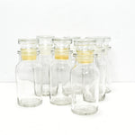7 Vintage Made in Japan Glass Spice Bottles with Glass and Plastic Stoppers
