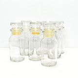 7 Vintage Made in Japan Glass Spice Bottles with Glass and Plastic Stoppers