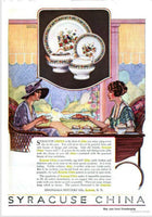 This is a vintage ad that is in color and shows two women sitting having tea together. There is an inset of the china pattern above them.