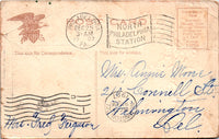 Shown is the back of the c. 1907 Christmas postcard. There are two postmarks on the back, both have the date of December 25, 1907 and was postmarked in Philadelphia, Pennsylvania. It was postmarked at the North Philadelphia Station. The postage stamp is missing. This has a divided back, one side for correspondence and the other side for the address. The postcard is signed by Mrs. Fred Ferguson. It was Address to Mrs. Annie Moore who resided in Wilmington, Delaware. 