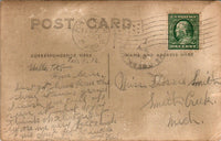This is a full view of the back of the postcard. There are two postmarks, one from Port Huron and the other from Smith Creek, both towns in Michigan. The writing on the back is in pencil. The back is discolored from age.