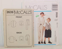 The paper instruction sheet for McCall's 2639 sewing pattern is shown propped up and slightly in front of the paper envelope.