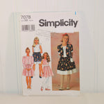 The front of the paper envelope for Simplicity 7078 is shown here propped up on a white background. On the left are three illustrated little girls, each wearing clothing that can be made from this sewing pattern. On the right is a young girl also wearing clothing that can be made from this sewing pattern. There is a faint store stamp on the front also.