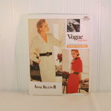 This is the front of the paper envelope for vintage Vogue 2057. It is from their Vogue Career line. It was designed by Anne Klein II. The pattern is from 1988. There are two color photos of women dressed in the dresses that can be made with this vintage pattern. The one on the left is dressed in a creamy white dress. The the other women is dressed in a red version of the dress.