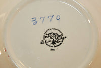 A close up of the back stamp and number 3770. The back stamp states Hand painted - underglaze, Southern Potteries, Inc. On a diagonal it states Blue Ridge, Made in U.S.A. Mountains and a pine tree are in the center.