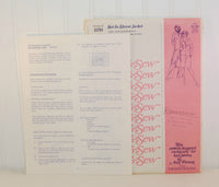 Shown is the instruction sheet for Stretch & Sew 1050. It is propped up in front and to the left of the paper envelope.