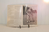 Another interior view of the vintage knitting booklet. On the left are knitting instructions. On the right is a young woman shown in a skirt and knitted top. She is standing next to a propped up small golf bag with golf clubs.