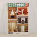 Shown is the front of the paper envelope for Simplicity 4098 of the Christopher Lowell Collection. There are five different color photos of the various window treatments that can be made with this sewing pattern.