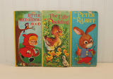 Little Red Riding Hood, The Ugly Duckling and Peter Rabbit vintage books.