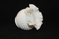 Side view of the Fenton hobnail milk glass vase, also showing a little bit of the interior.