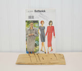 The tissue paper pattern is laying in front of the envelope for Butterick 6209. It is factory folded and unused.