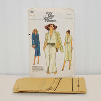 The tissue paper sewing pattern for Vogue 7291 is laying in front of the paper envelope. The sewing pattern is factory folded.