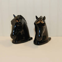 A beautiful pair of vintage Abingdon pottery black horse head bookends.