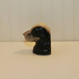 This is another view of the cocker spaniel bookend. It is on a white background.