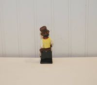 The back view of the Royal Doulton Sam Weller figurine.