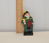There is a wood ruler standing up next to the Bumble figurine, it is to the left and shows that he is almost 4 inches tall.