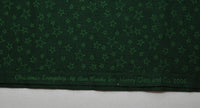 Christmas Everyday by Ann Wanke by Henry Glass and Company Cotton Quilting Fabric (c. ?) Green Stars on a Dark Green Background