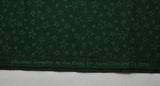 Christmas Everyday by Ann Wanke by Henry Glass and Company Cotton Quilting Fabric (c. ?) Green Stars on a Dark Green Background