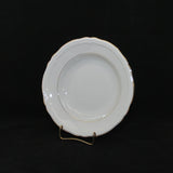Here is a fine example of a Seltmann fine china white shallow serving or soup bowl. It is a creamy white fine china with a delicate gold trim on the inner rim and outer edge of the bowl. The pattern is call Marie Luise.