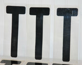 Close up of the vintage plastic sign letter, capital T