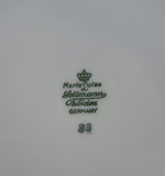 A close up of the Seltmann backstamp. There is a crown and under that are the words, Marie Luise, Seltmann, Weiden, Germany and the number 88. The backstamp is green in color and is on the bottom of the soup tureen.